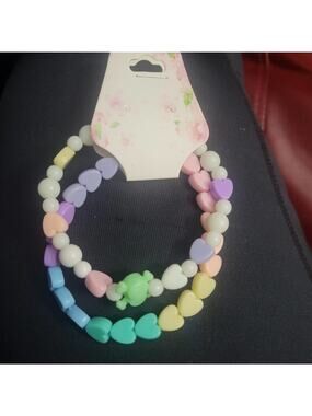 Skull bead and kandi pastel rainbow beaded bracelets
